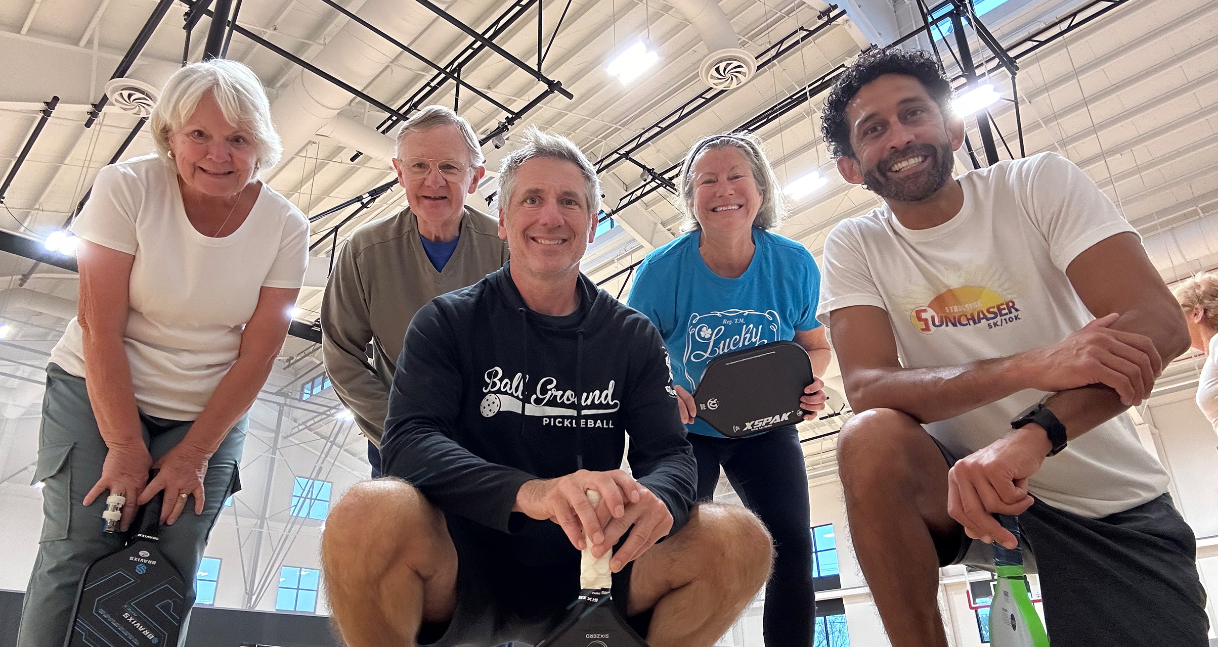 Pickleball students smiling after a lesson