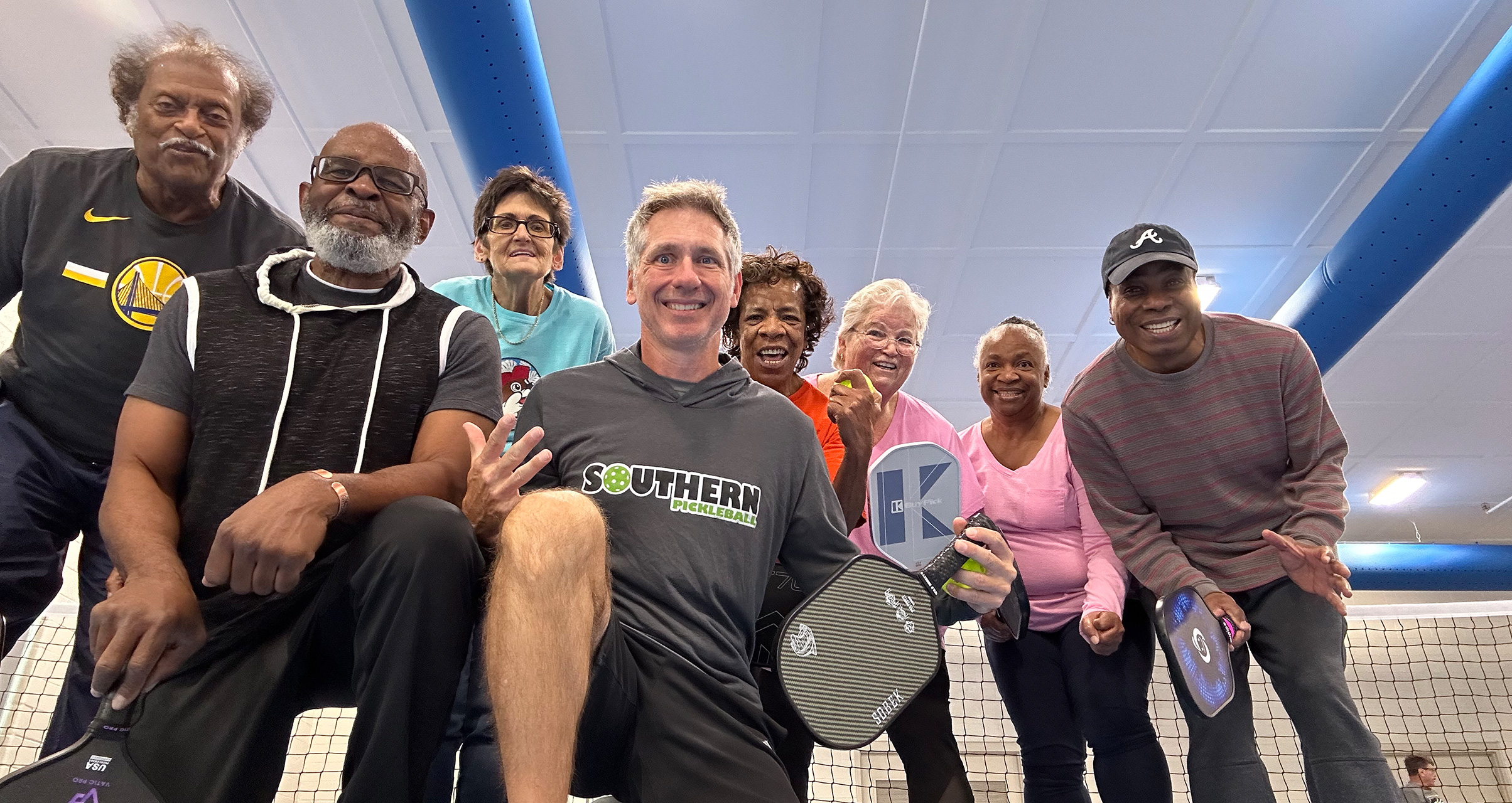 Pickleball students with paddles